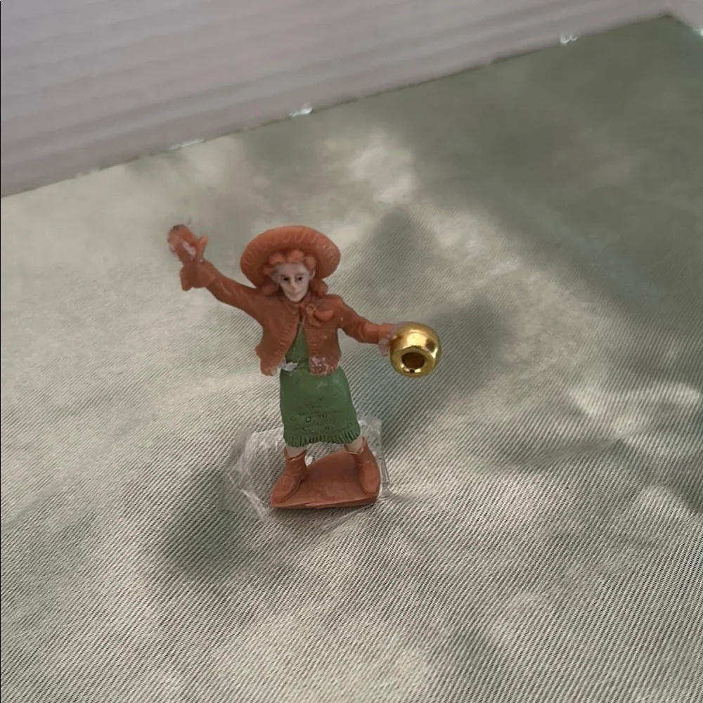 Charming Figurine with Green and Brown Attire